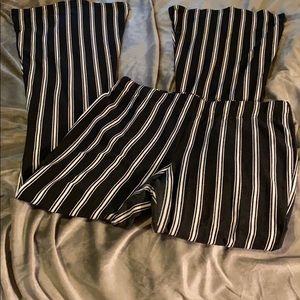 Black and white striped bell bottom leggings
